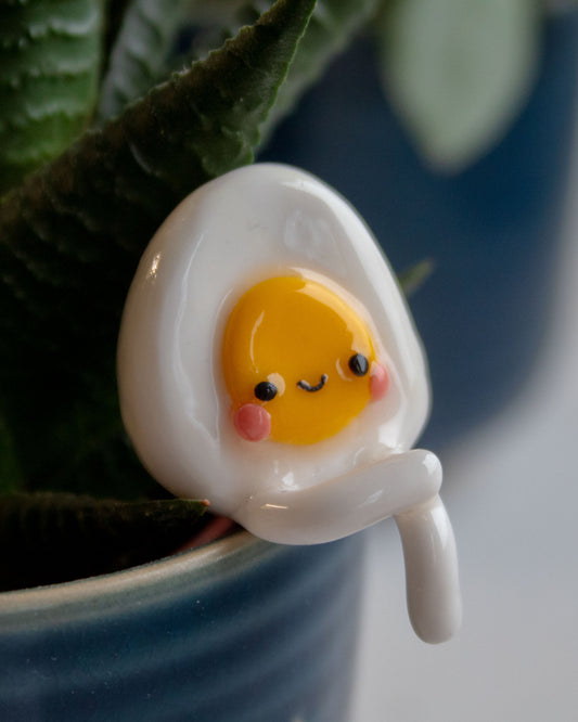 leggy eggy figurine