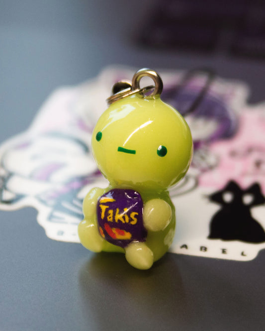 green guy with Hot Takis charm/keychain